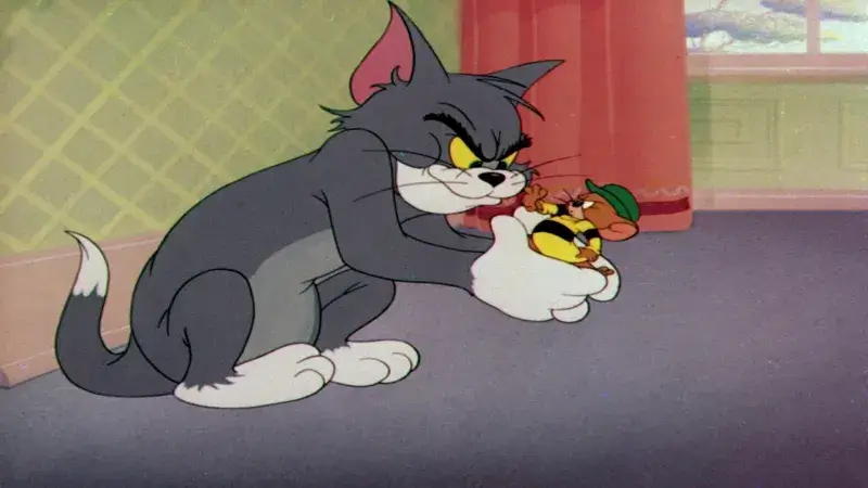 Tom và Jerry nhìn nhau ánh mắt đầy tinh quái.