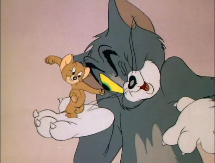 Tom và Jerry cùng nhau nhảy múa trong niềm vui.