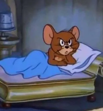 Jerry chống tay suy nghĩ ko hiểu chuyện gì