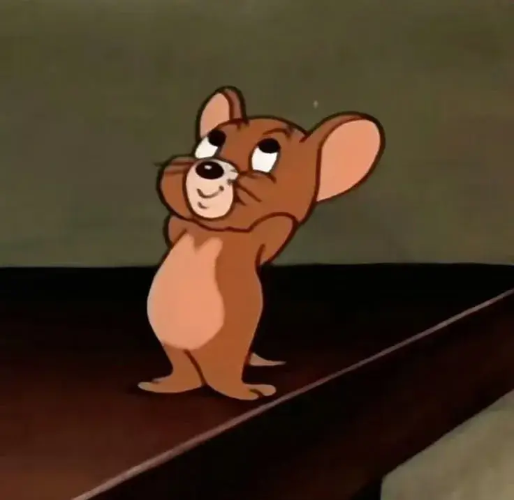 Jerry cười ác ý, gương mặt đầy toan tính.