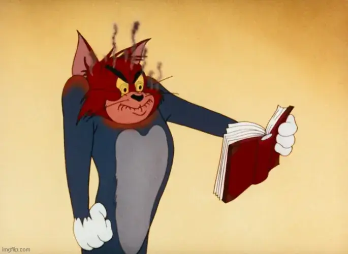 Meme mèo Tom giận dữ đôi mắt lóe tia khó chịu