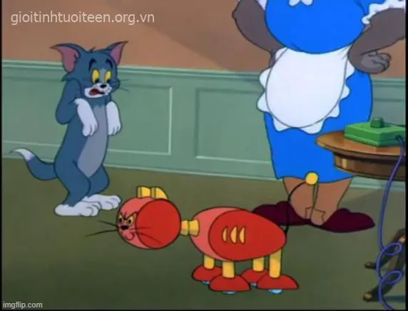 Ảnh Tom cười ranh mãnh ánh mắt lóe tia gian.