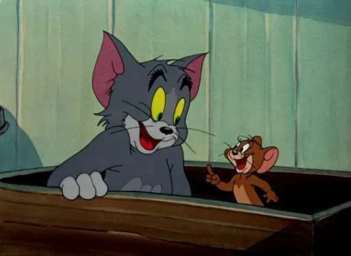 Meme Tom và Jerry toe toét cười trong khung cảnh.