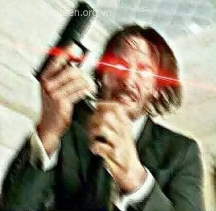 Meme John Wick cầm súng trông đầy kịch tính giả.