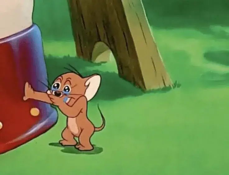 Hình ảnh chuột Jerry khóc tủi thân, ánh mắt long lanh buồn.