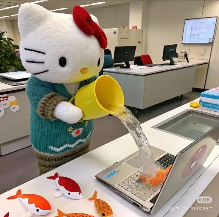 Meme Hello Kitty đổ nước vào laptop