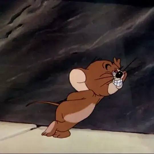 Jerry cười đểu, đôi mắt liếc nhìn gian xảo.