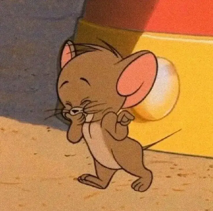 Jerry cười rạng rỡ, nụ cười tỏa sáng vui vẻ.