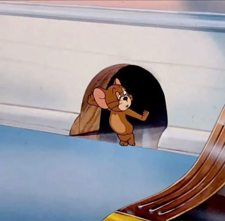 Jerry gương mặt thiểu năng, mắt lác miệng há.