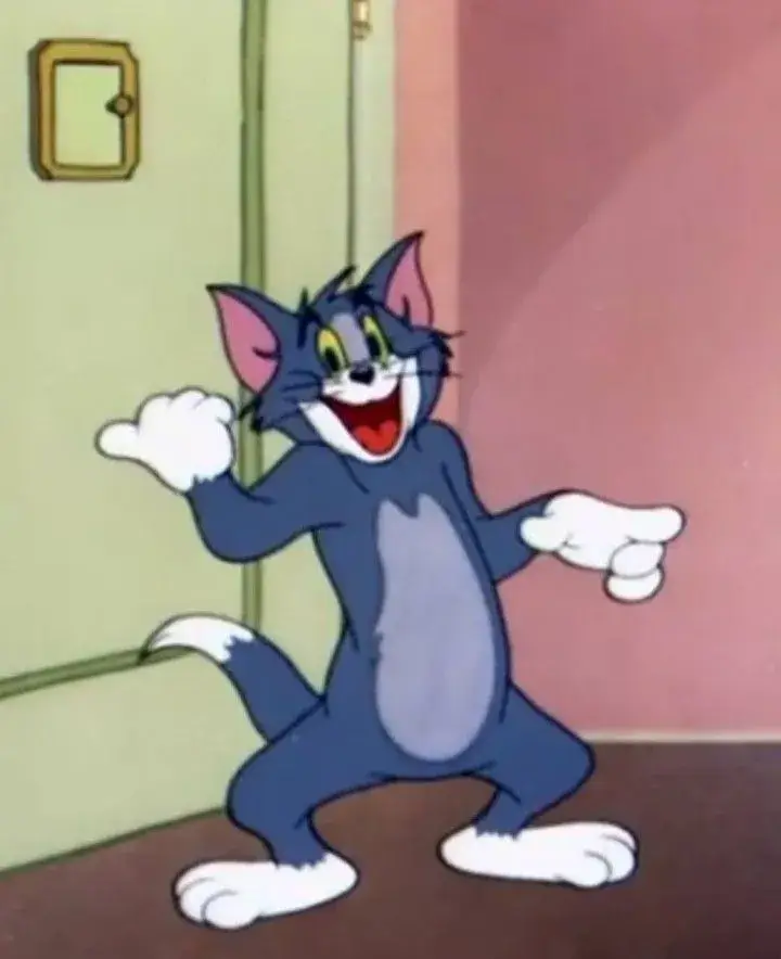 Mèo Tom cười phá lên chỉ tay rất vui nhộn