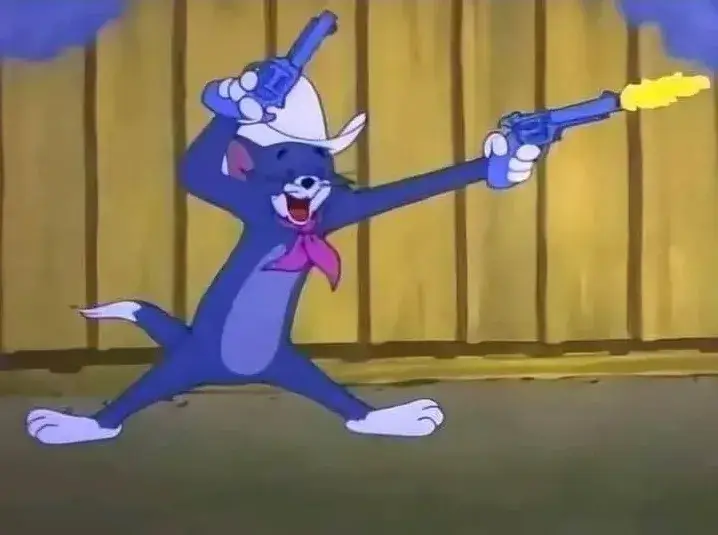 Meme Tom bắn súng cười rạng rỡ trông nổi bật