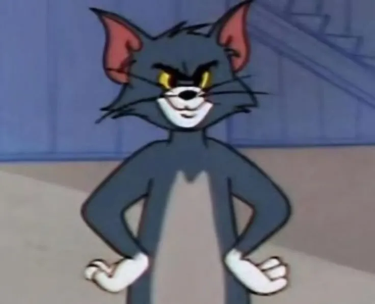 Meme Tom cười méo xệch nhìn buồn cười