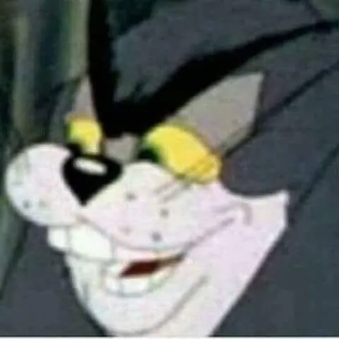 Mèo Tom cười nhe răng nhìn hài hước