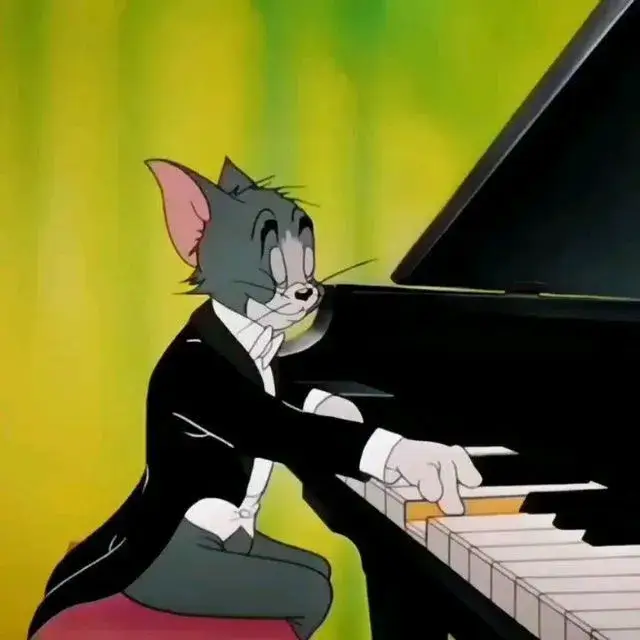 Meme mèo Tom trong bộ vest chỉnh chu, lịch sự.