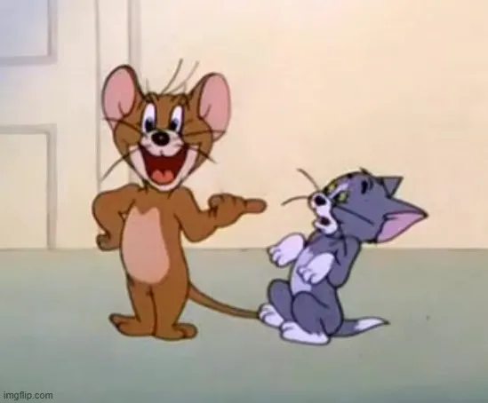 Chuột Jerry troll Tom lầy lội, gương mặt gian xảo.