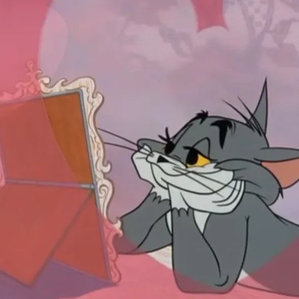 Hình Tom ngơ ngác, mắt tròn xoe đáng yêu.